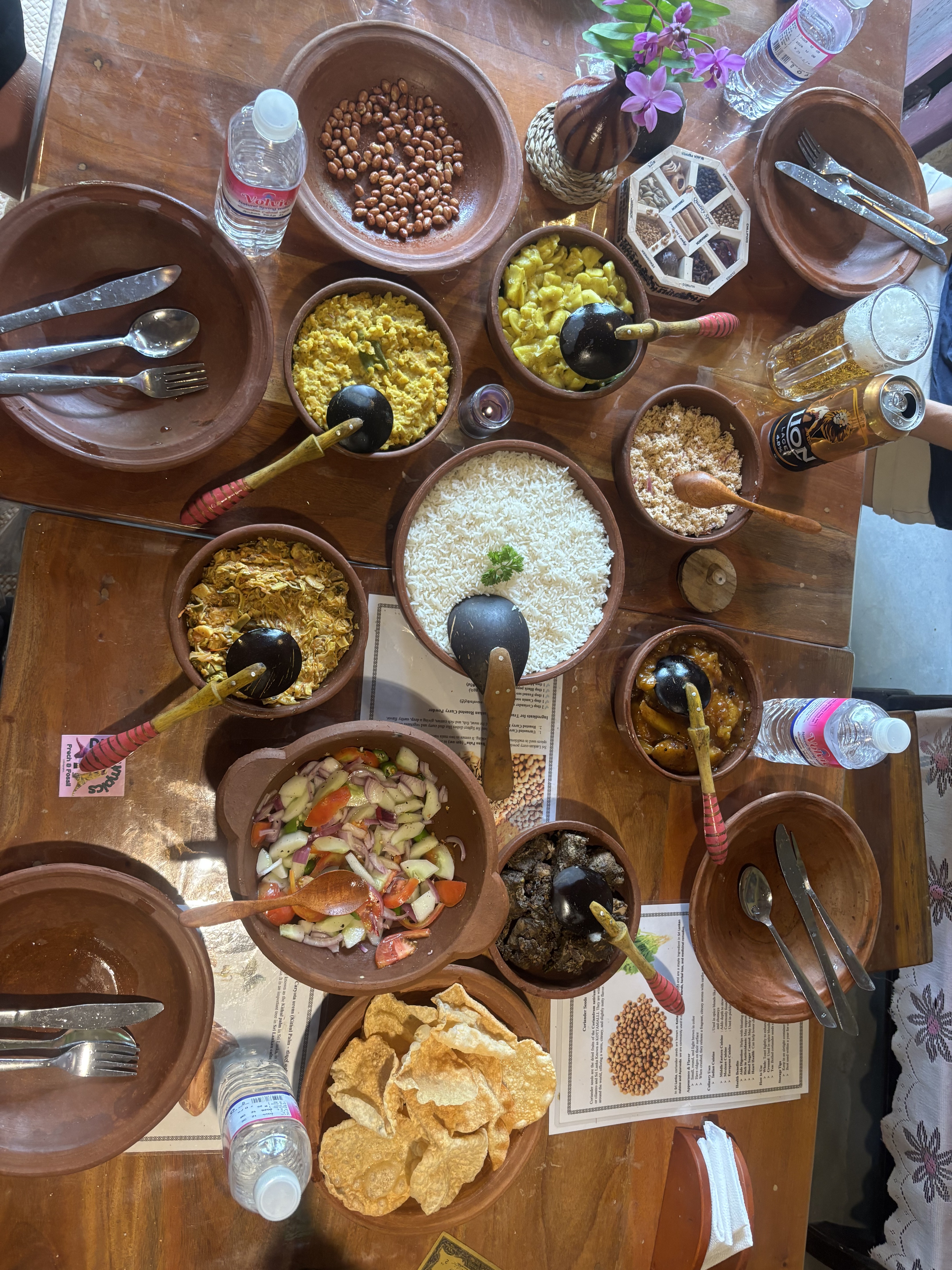 Authentic Sri Lankan feast — curries and red rice served in clay pots