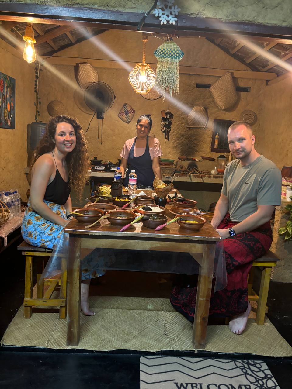 Sitting down to enjoy the handmade feast in our rustic kitchen